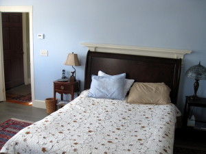 The first-floor bedroom is the largest.  It was probably the receiving room for guests in the original house, and had the most complex molding trim.  