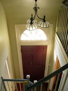 The front door has an interesting fan-shaped window over the door which was typical for the Federalist period.